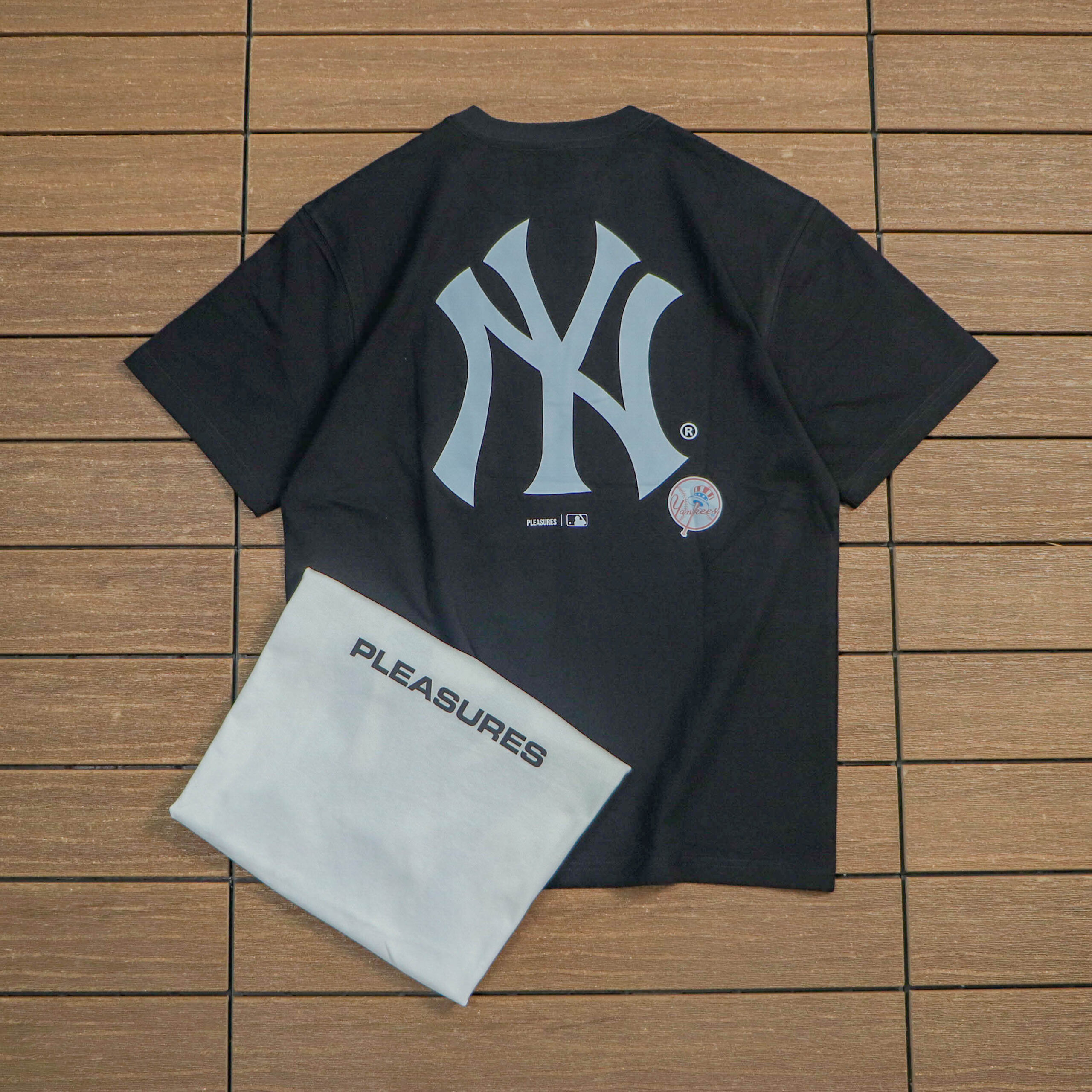 PLEASURES T-SHIRT